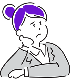 女性が肘をついて悩んでいる